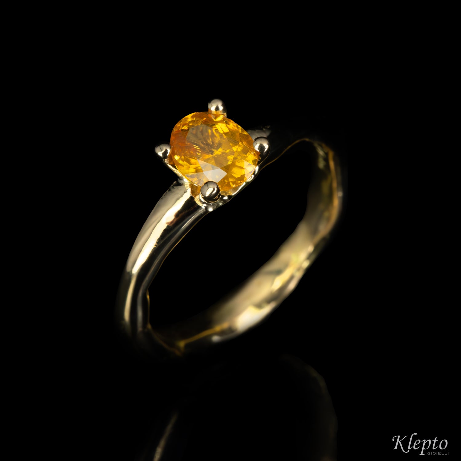 Anello in oro giallo "Divenire" con Zircone naturale giallo