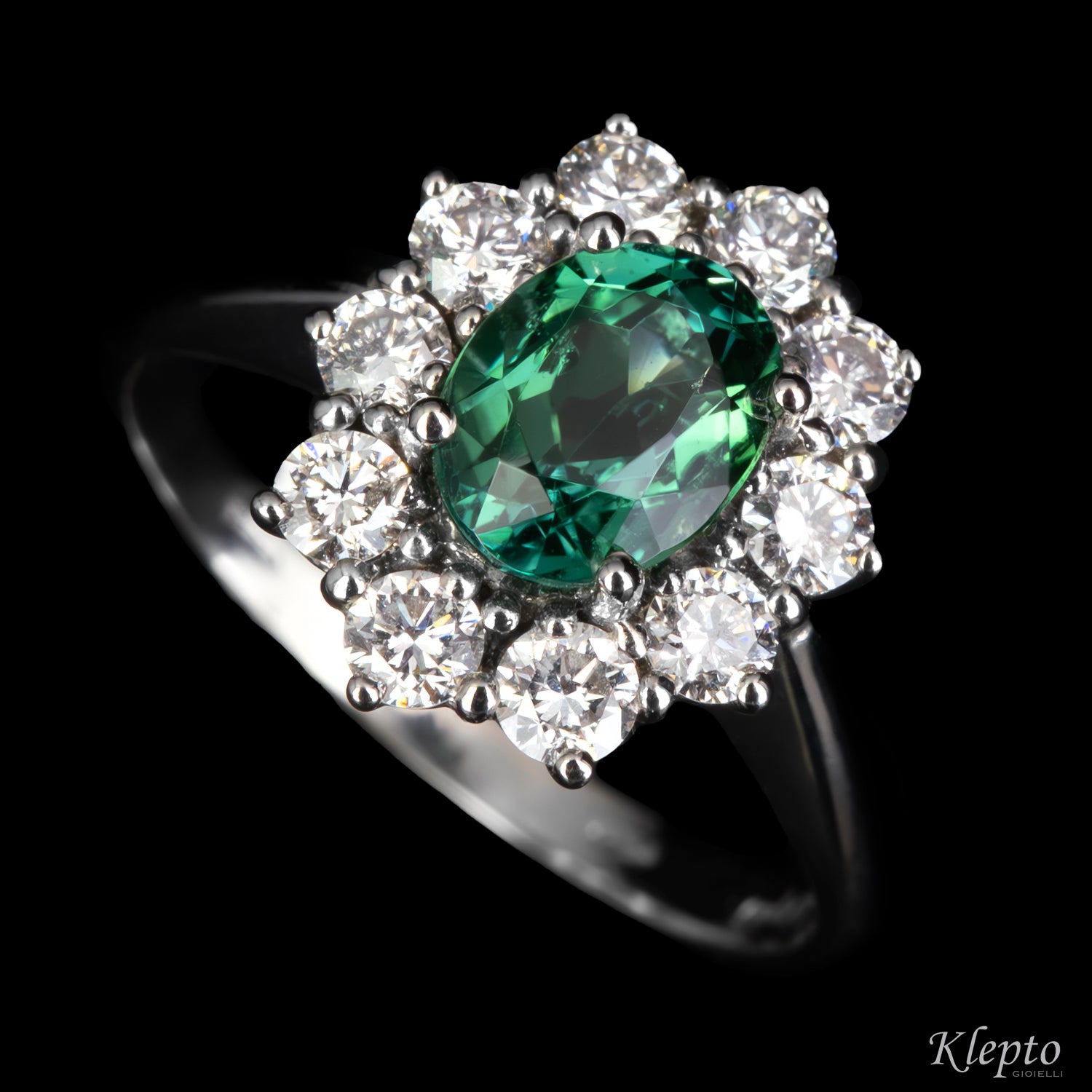 Anello classico in oro bianco con Tormalina verde e contorno di Diamanti