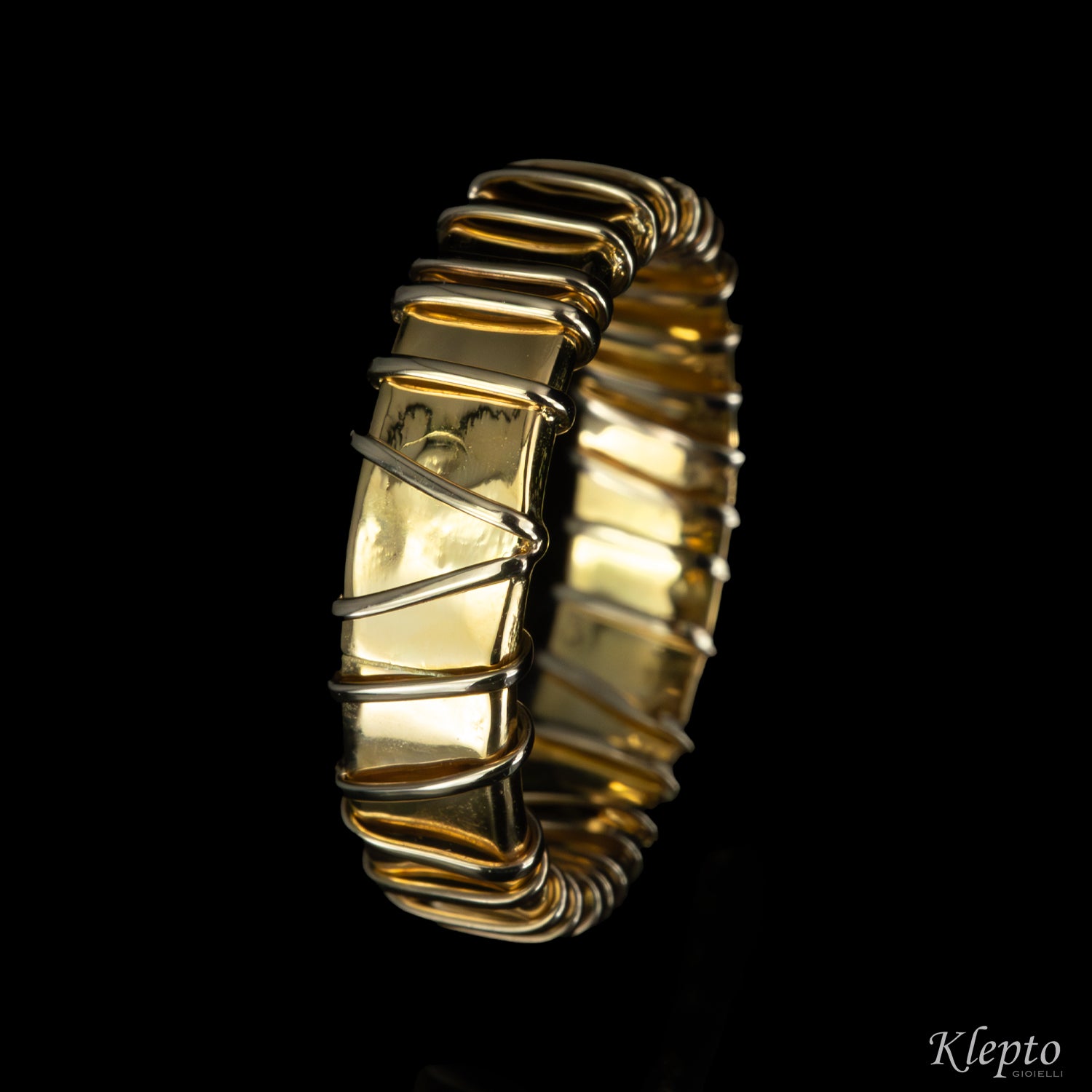 Anello in oro giallo e bianco naturale