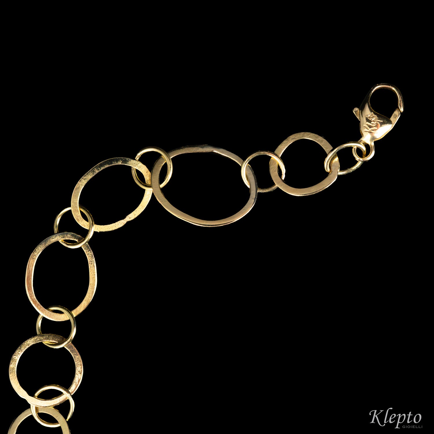 Bracciale in oro giallo ad anellI