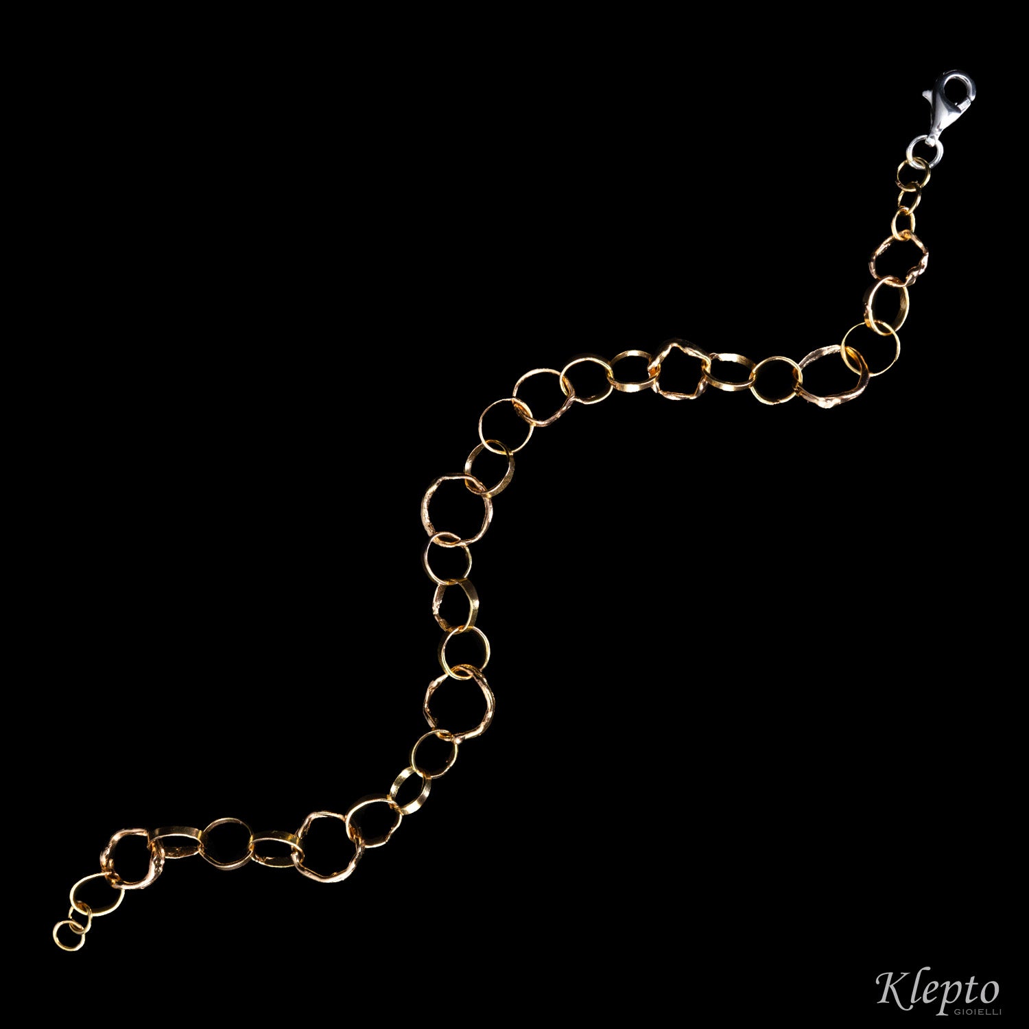 Bracciale in oro rosa e bianco ad anelli