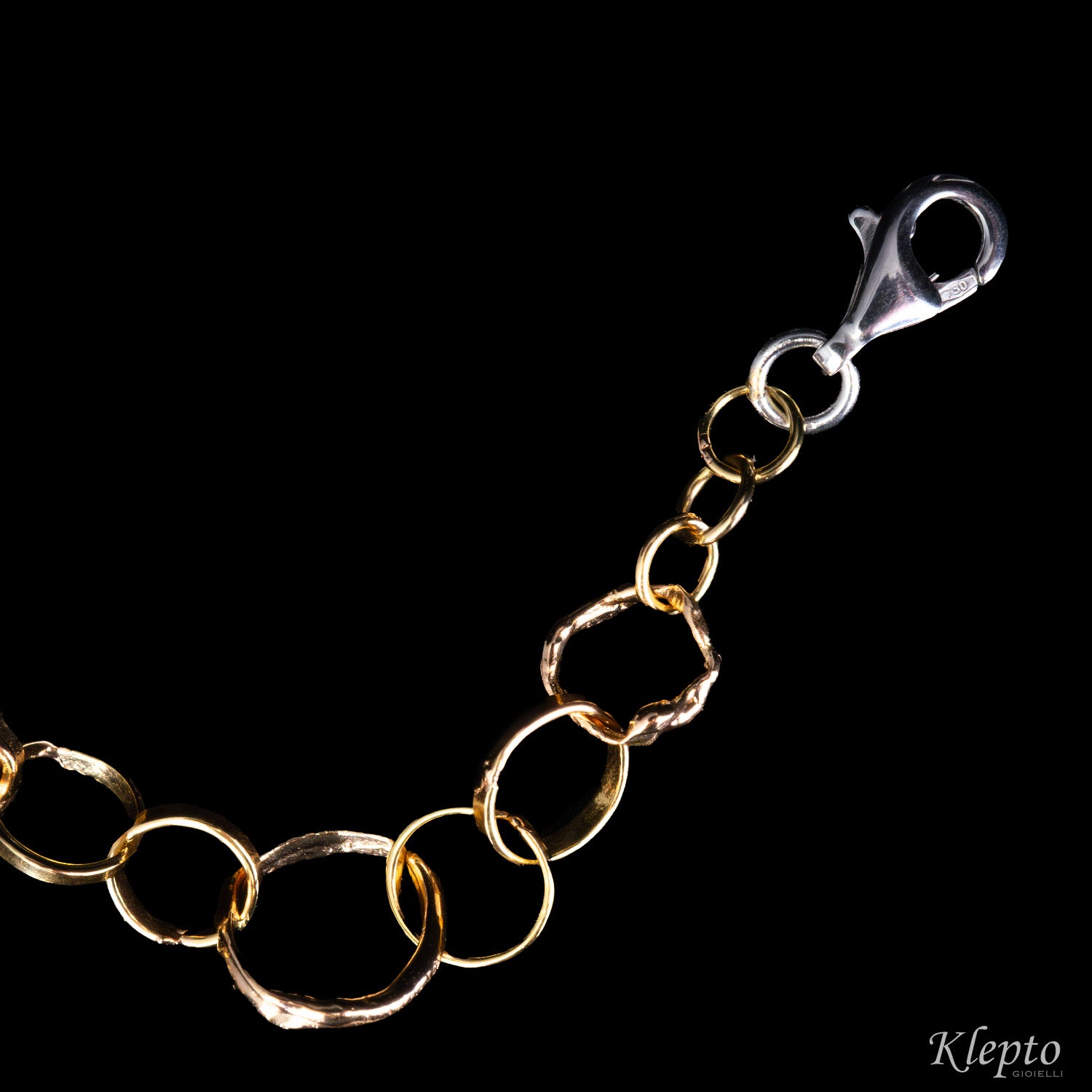 Bracciale in oro rosa e bianco ad anelli