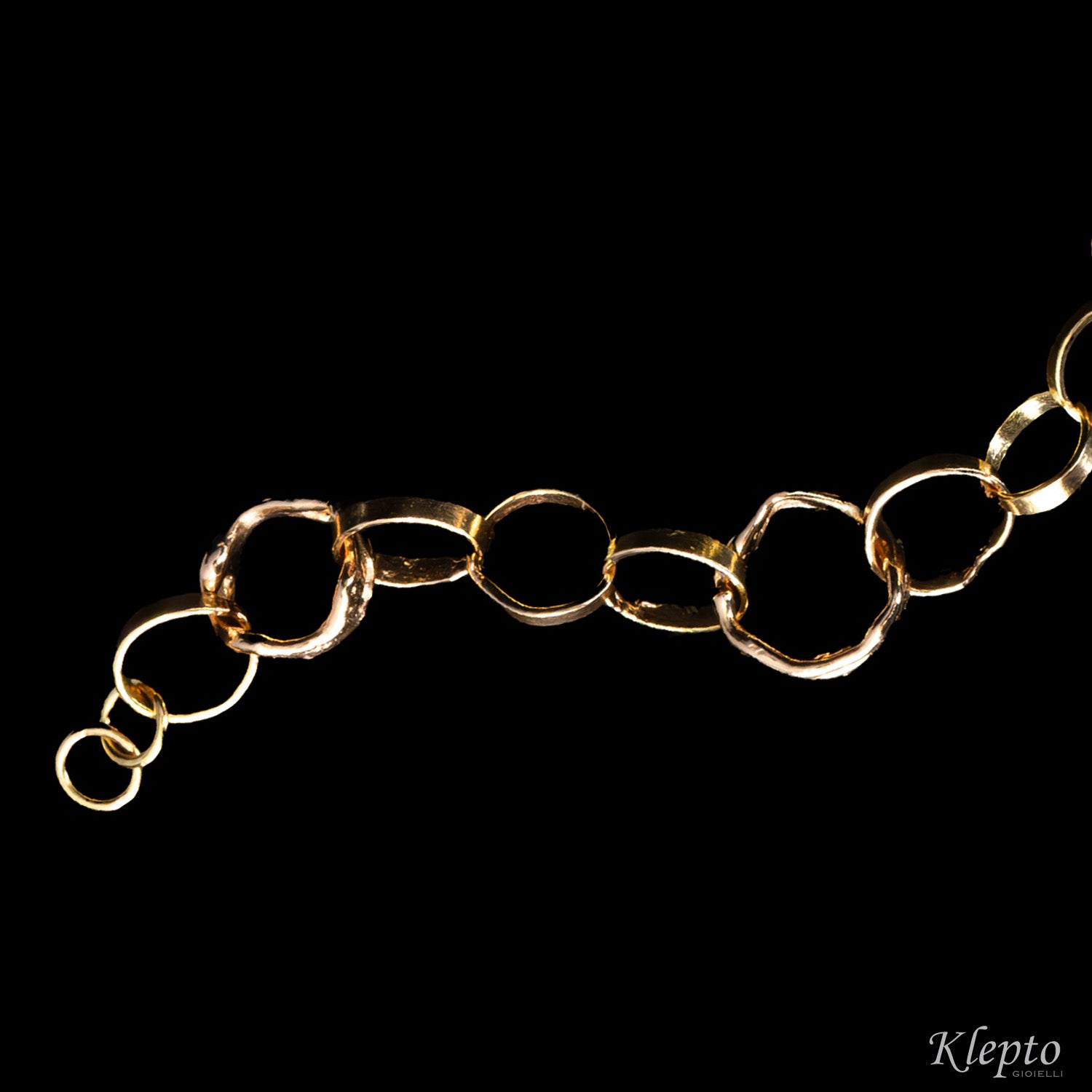 Bracciale in oro rosa e bianco ad anelli