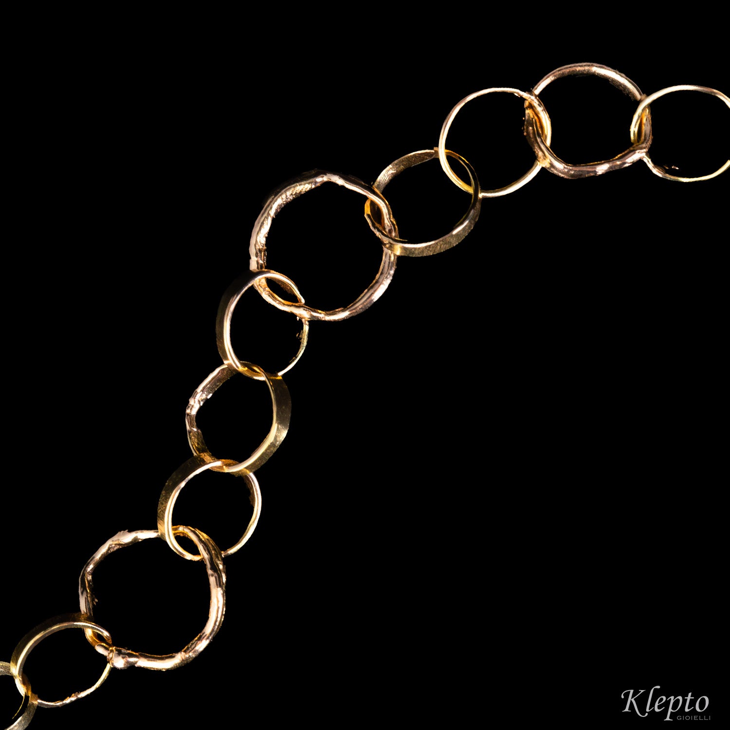 Bracciale in oro rosa e bianco ad anelli