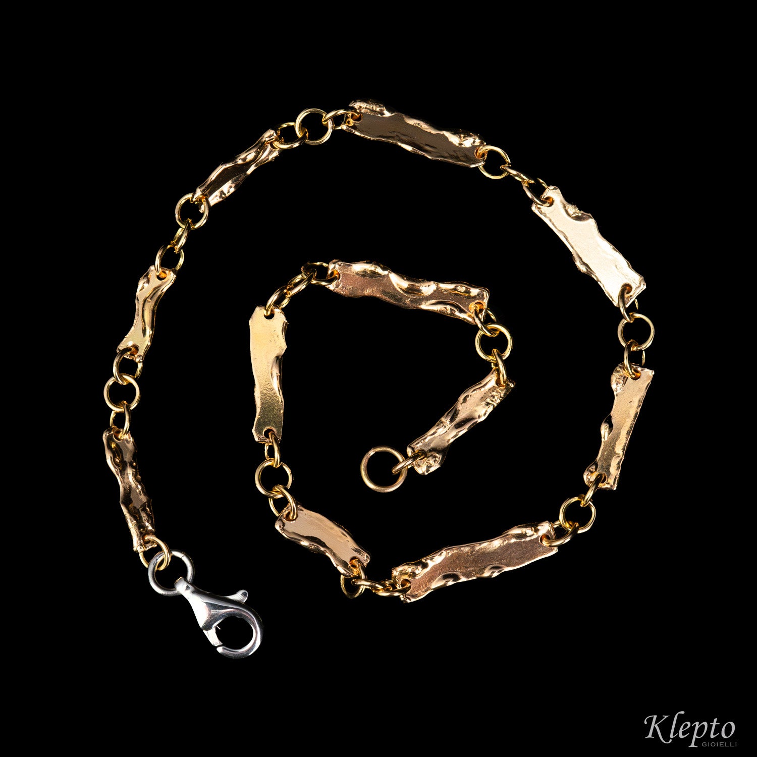 Bracciale in oro rosa e bianco con lastre fuse
