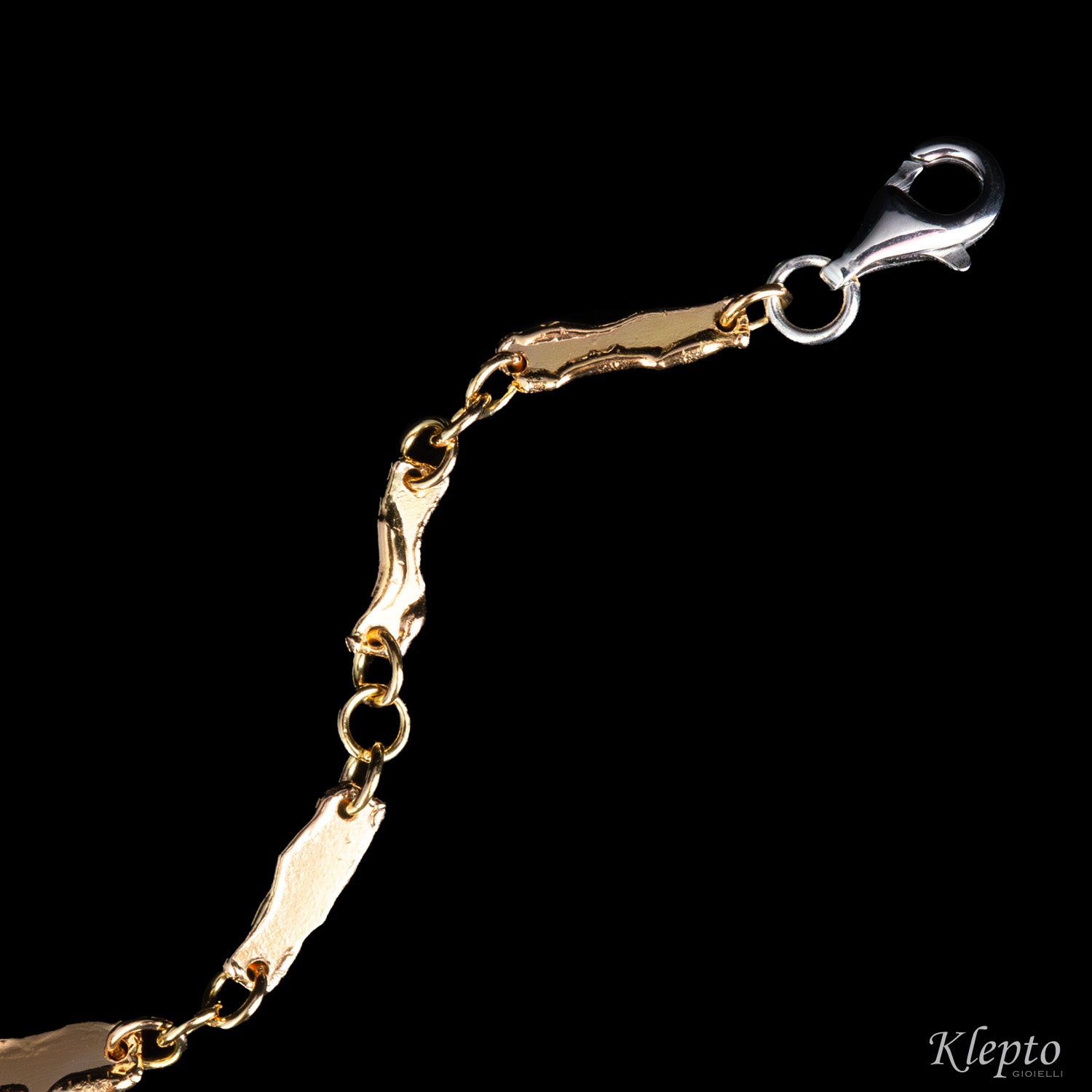 Bracciale in oro rosa e bianco con lastre fuse