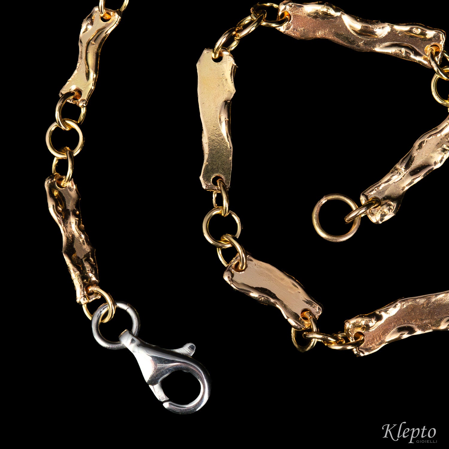 Bracciale in oro rosa e bianco con lastre fuse