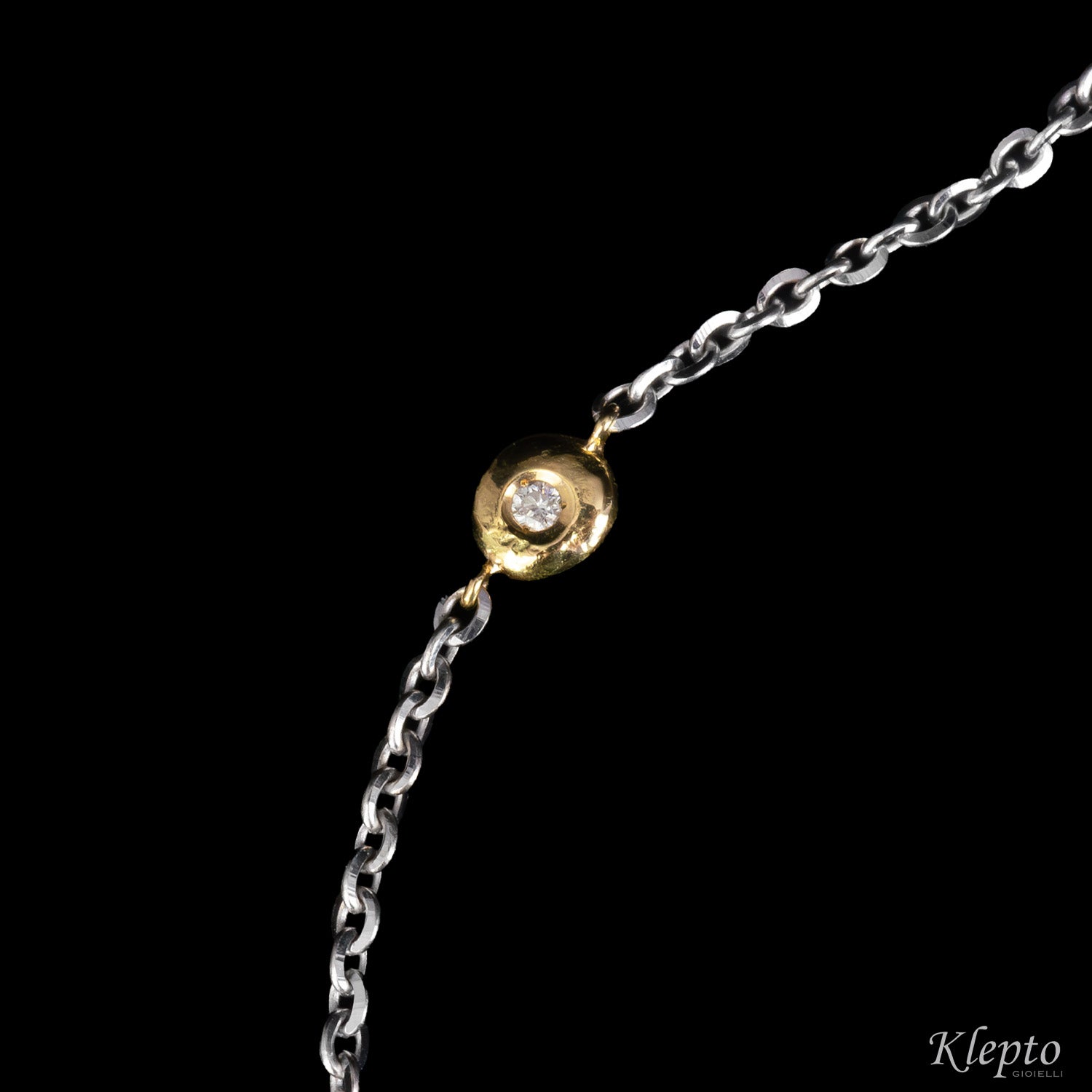 Bracciale in oro bianco e giallo con Diamante "Pepita"