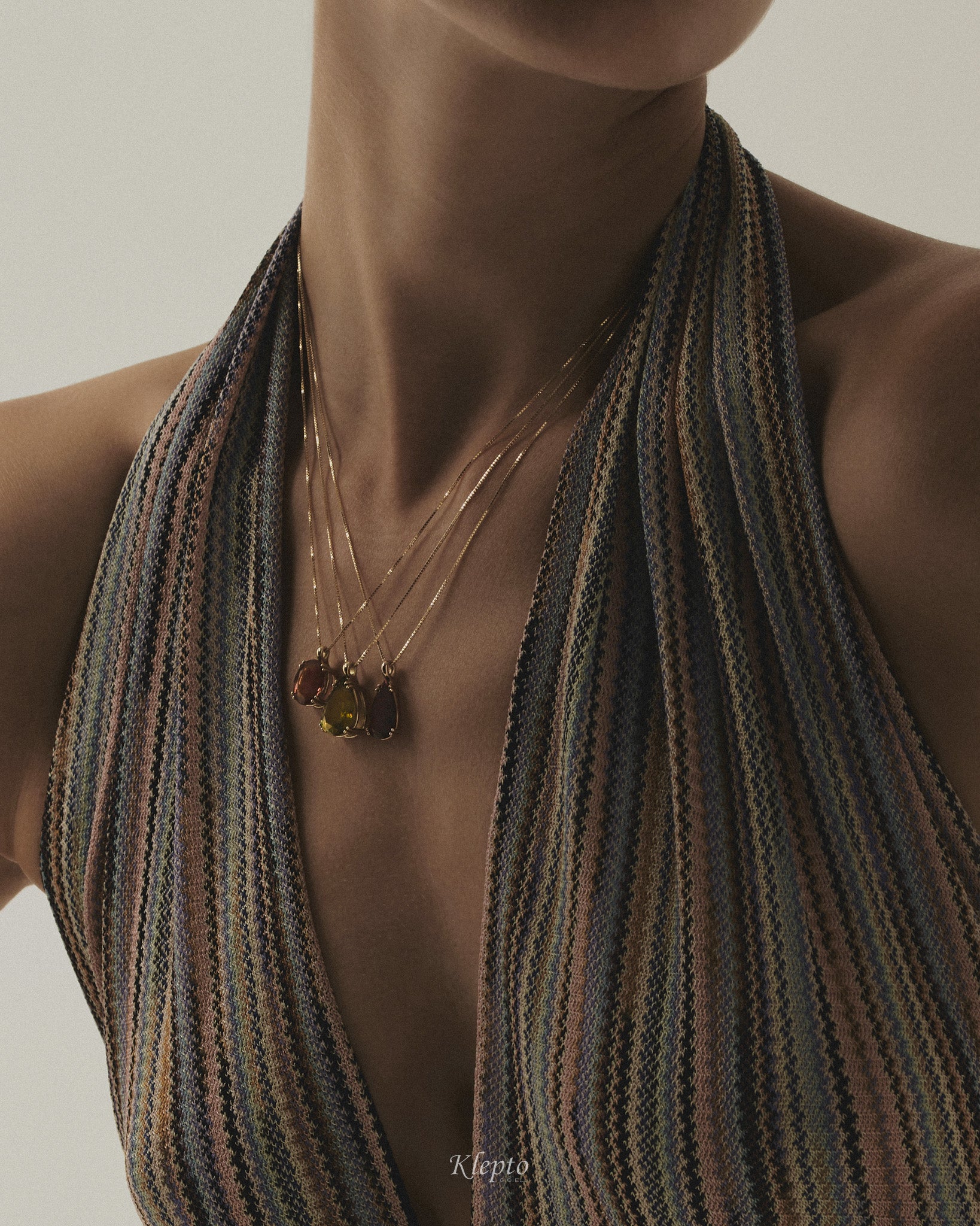 Pendente in oro giallo con Sfene