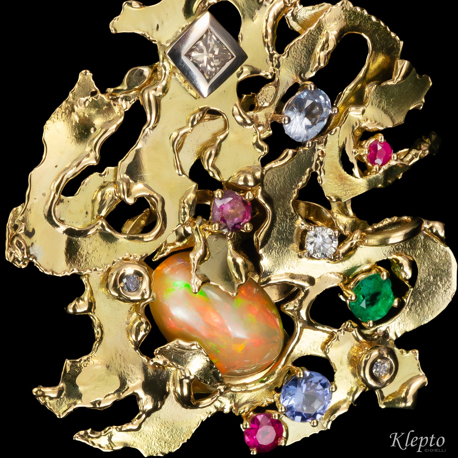 Pendente in oro scultura "Micromondo" con pietre preziose e tesoro nascosto