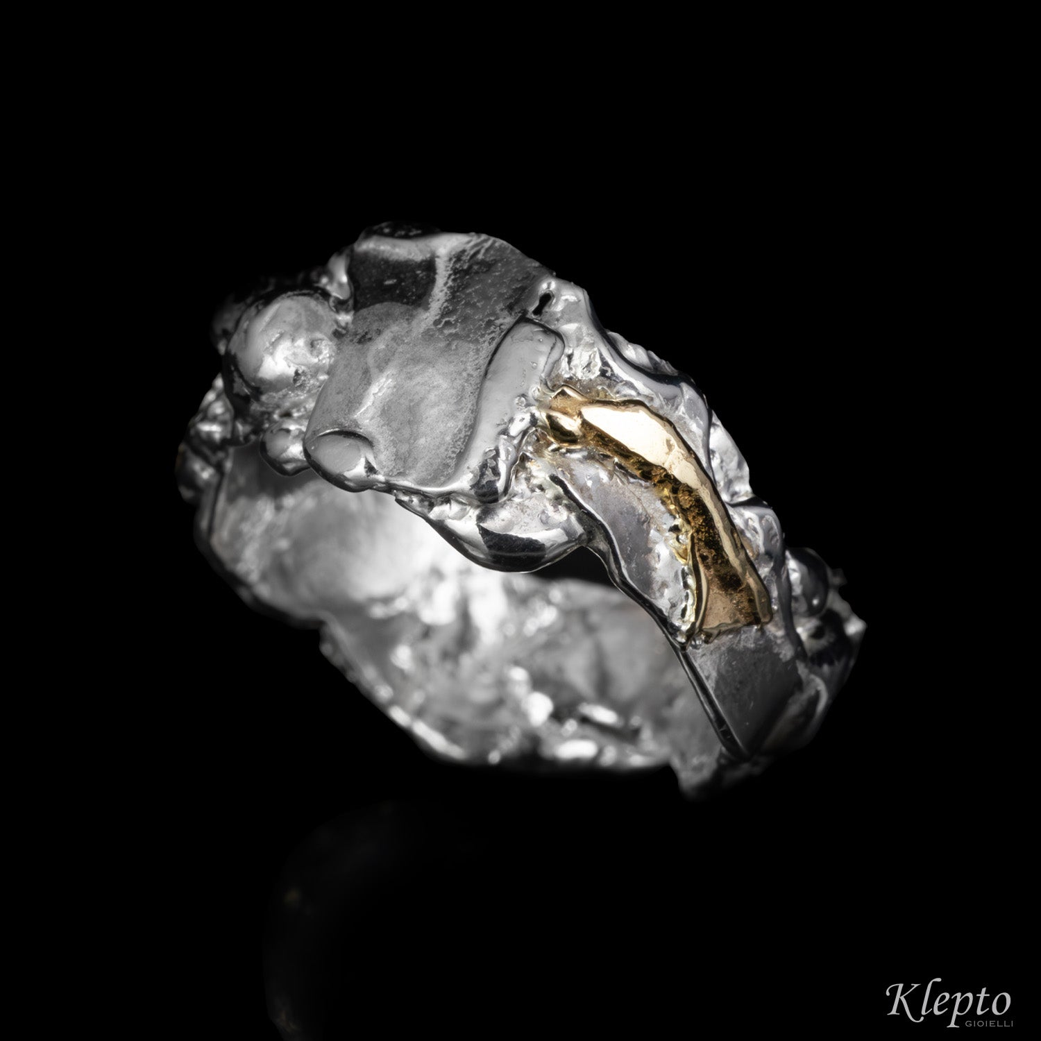 Anello in Argento Silnova® e oro giallo "Metamorfosi"