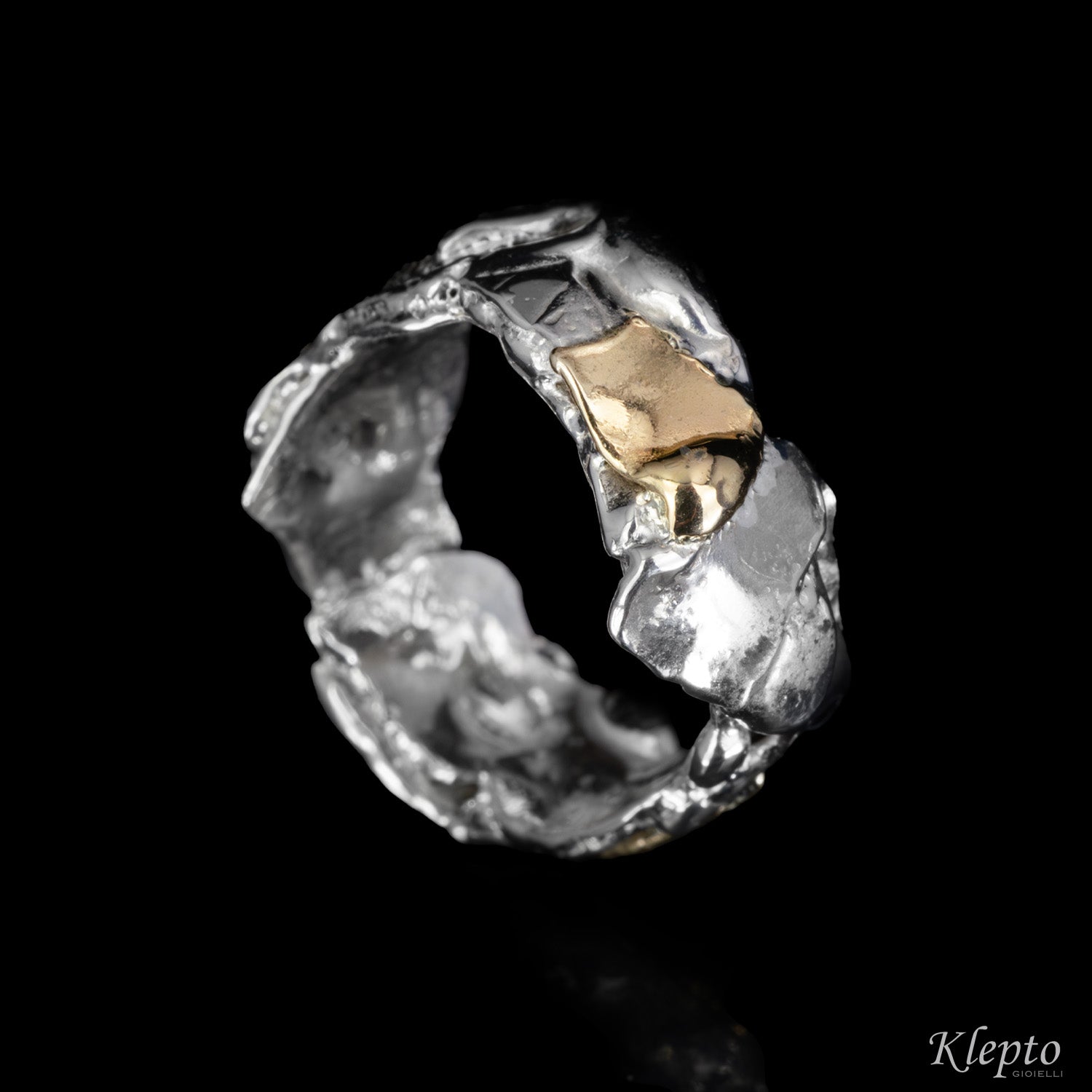 Anello in Argento Silnova® e oro giallo "Metamorfosi"