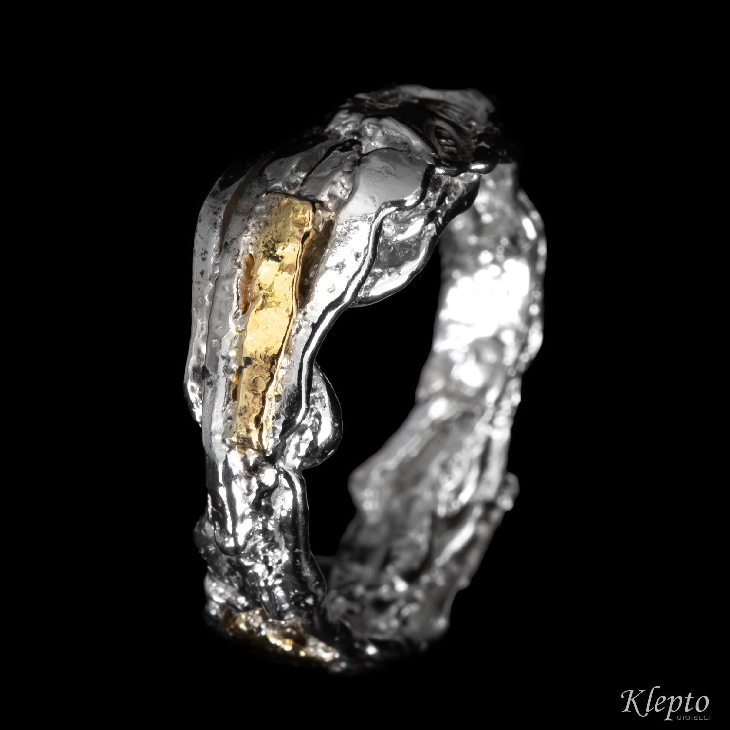 Anello in Argento Silnova® e oro giallo "Metamorfosi"