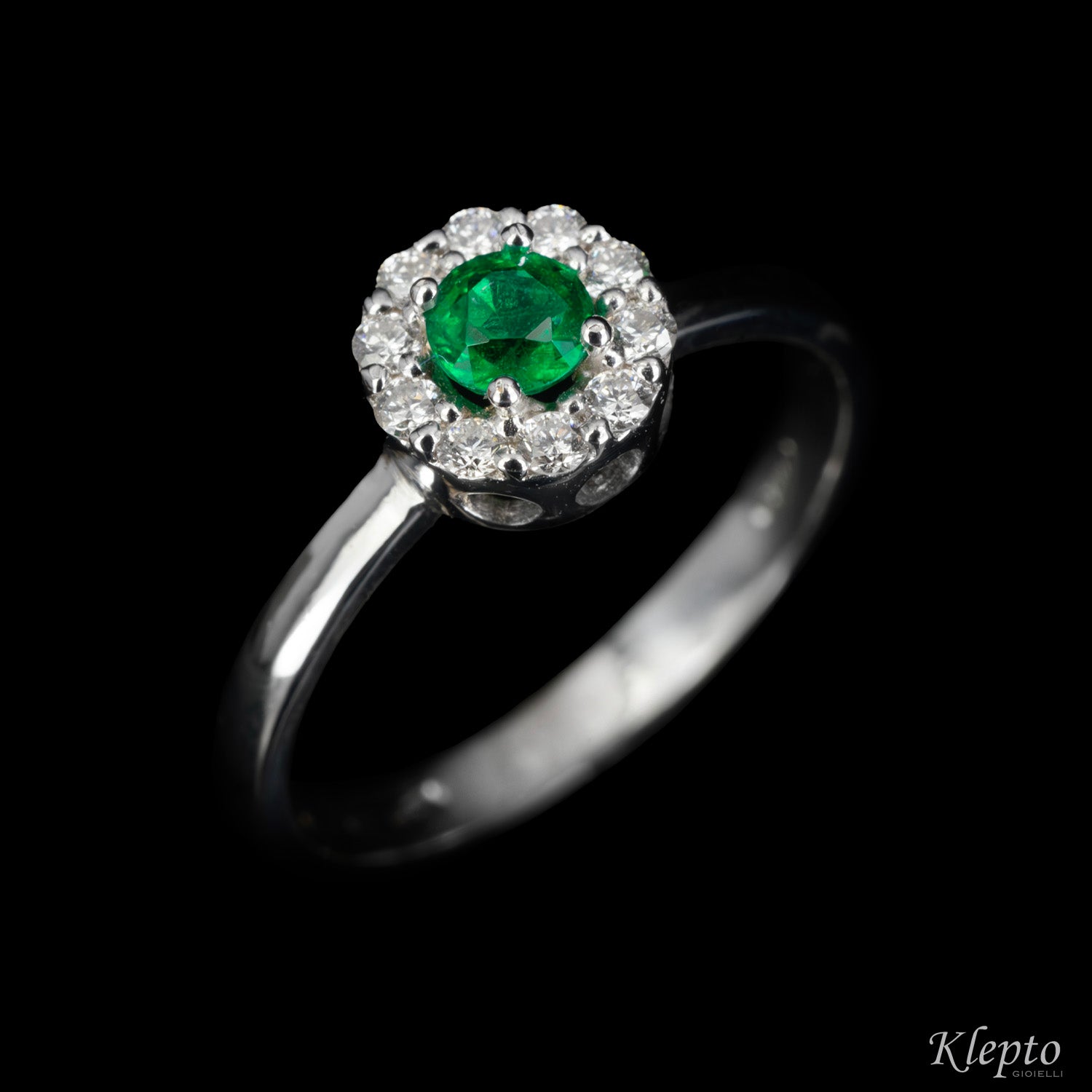 Anello classico in oro bianco con Smeraldo e Diamanti