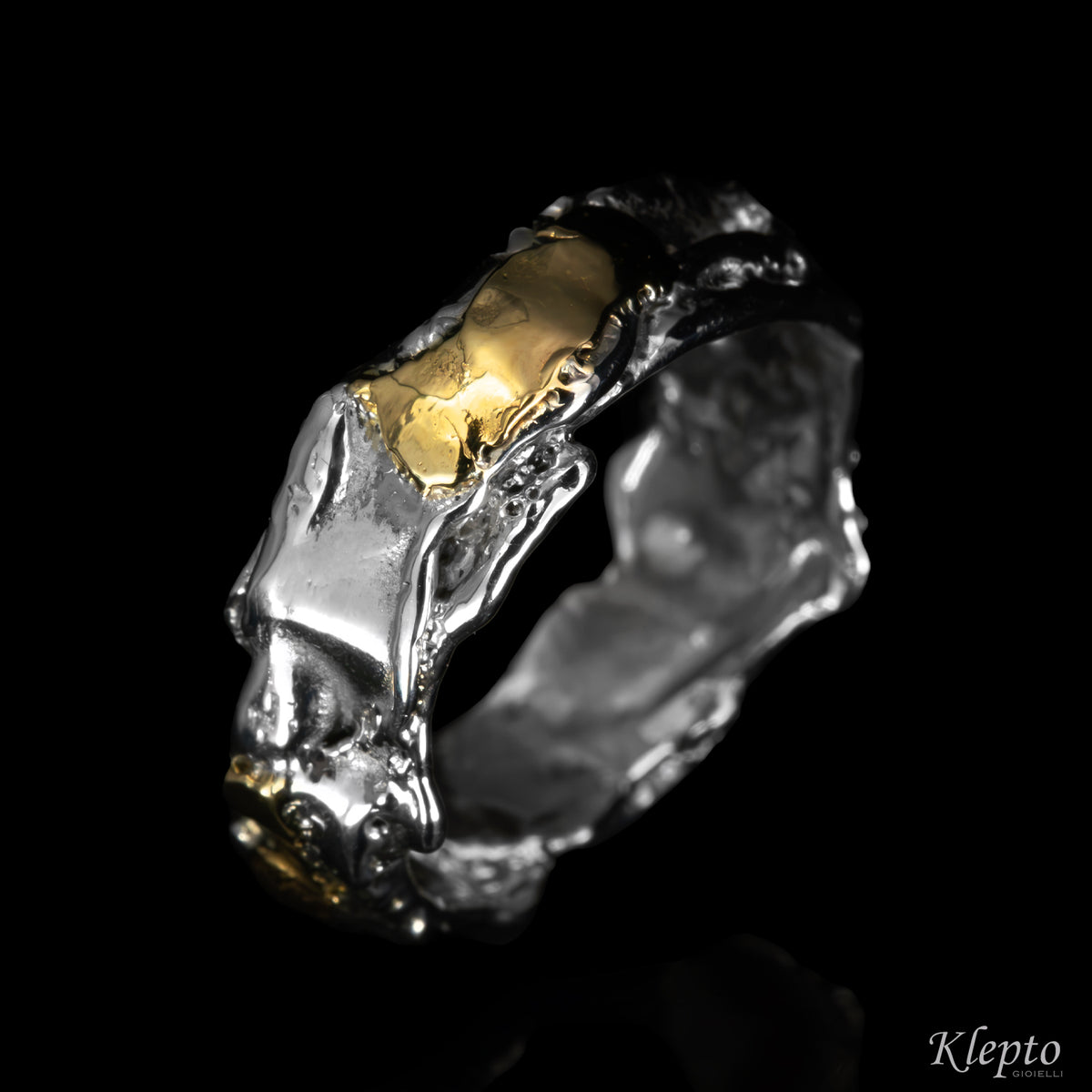 Anello in Argento Silnova® e oro giallo "Metamorfosi"
