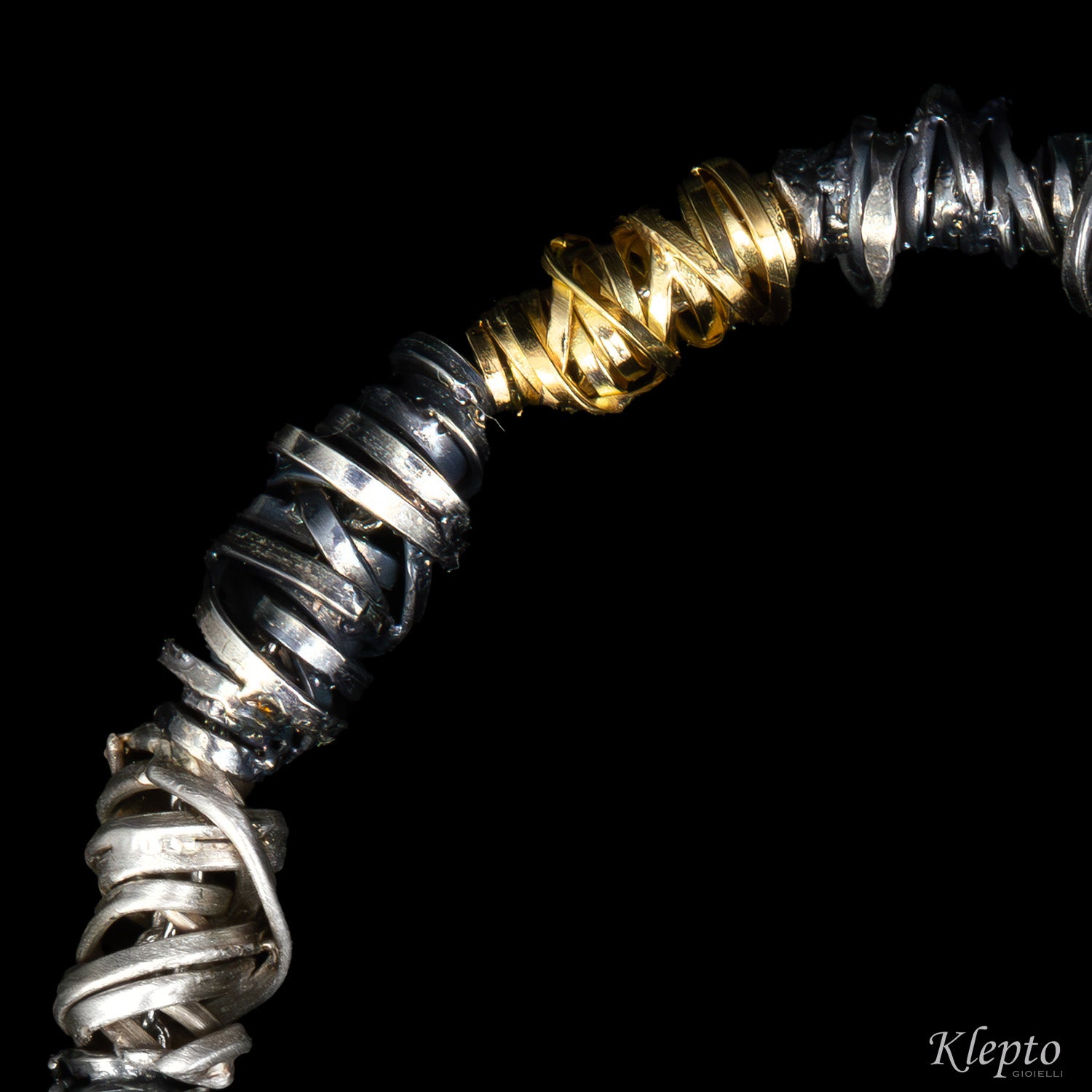 Bracciale in Argento Silnova® con elementi in oro giallo e bruniti