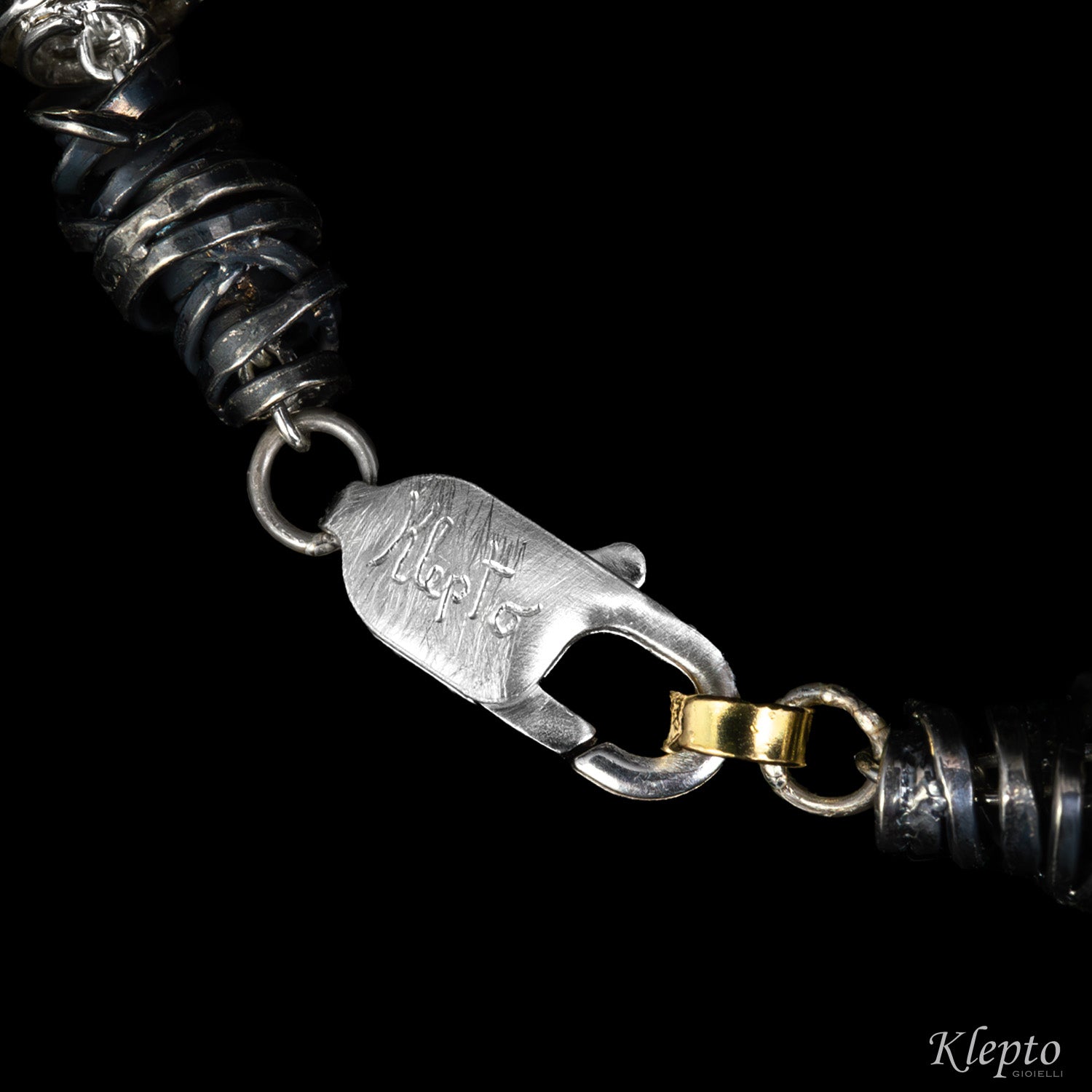 Bracciale in Argento Silnova® con elementi in oro giallo e bruniti