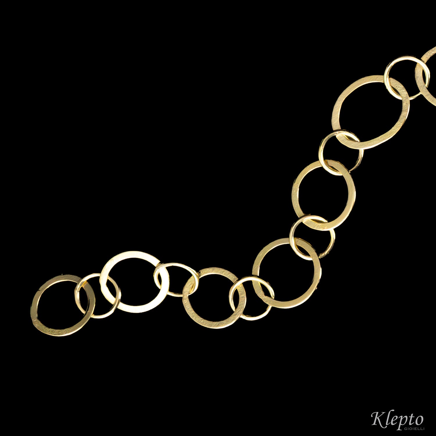 Bracciale in oro giallo ad anellI