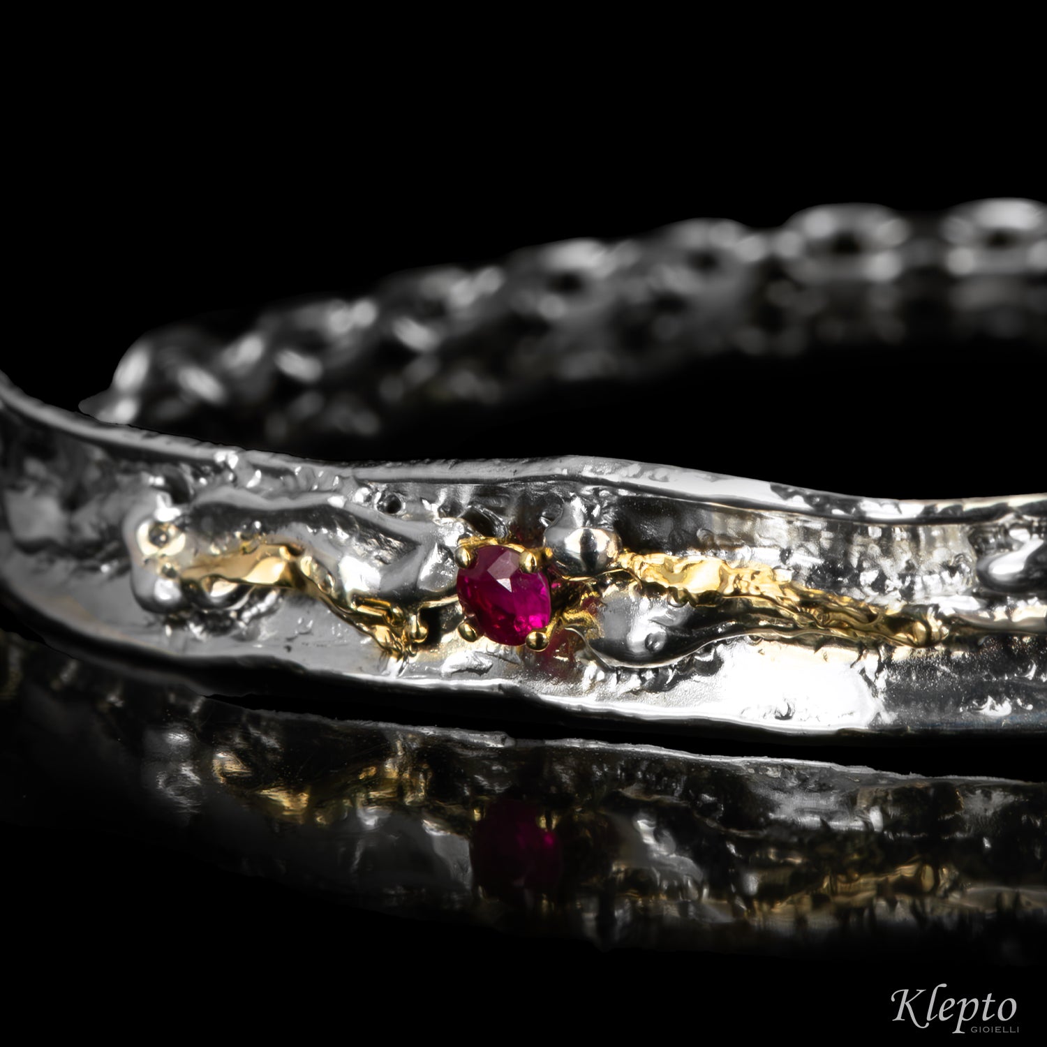 Bracciale in Argento Silnova® con Rubino e dettagli in oro giallo