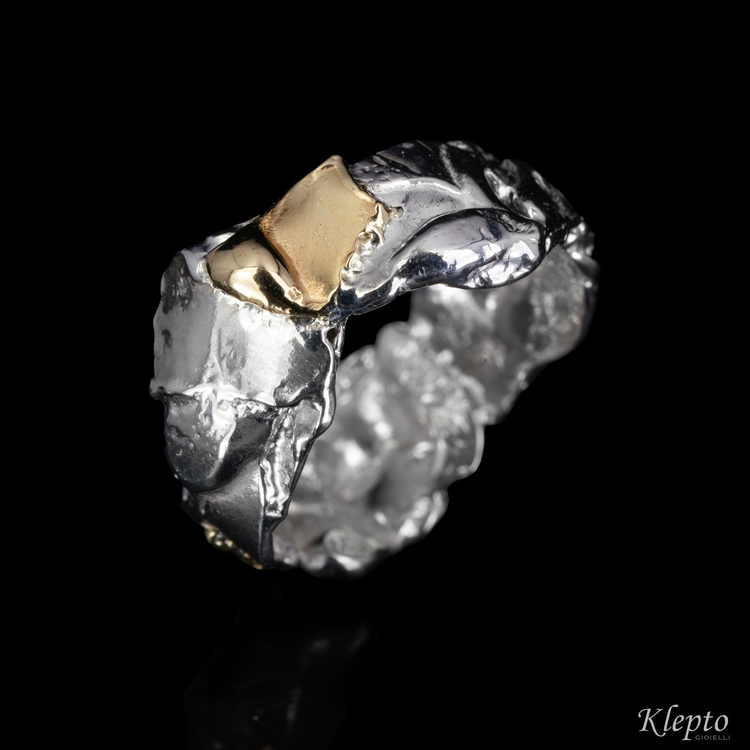 Anello in Argento Silnova® e oro giallo "Metamorfosi"