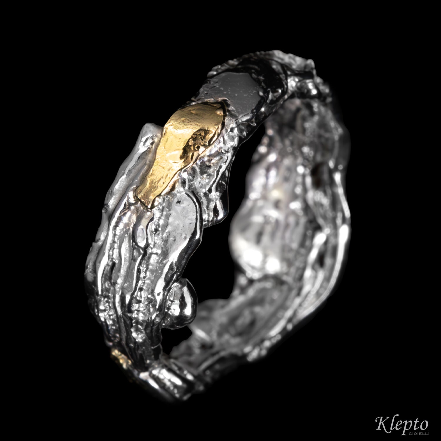 Anello in Argento Silnova® e oro giallo "Metamorfosi"