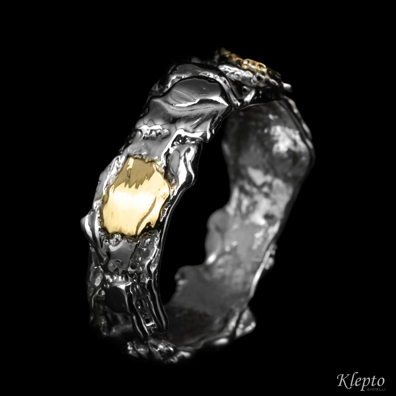 Anello in Argento Silnova® e oro giallo "Metamorfosi"