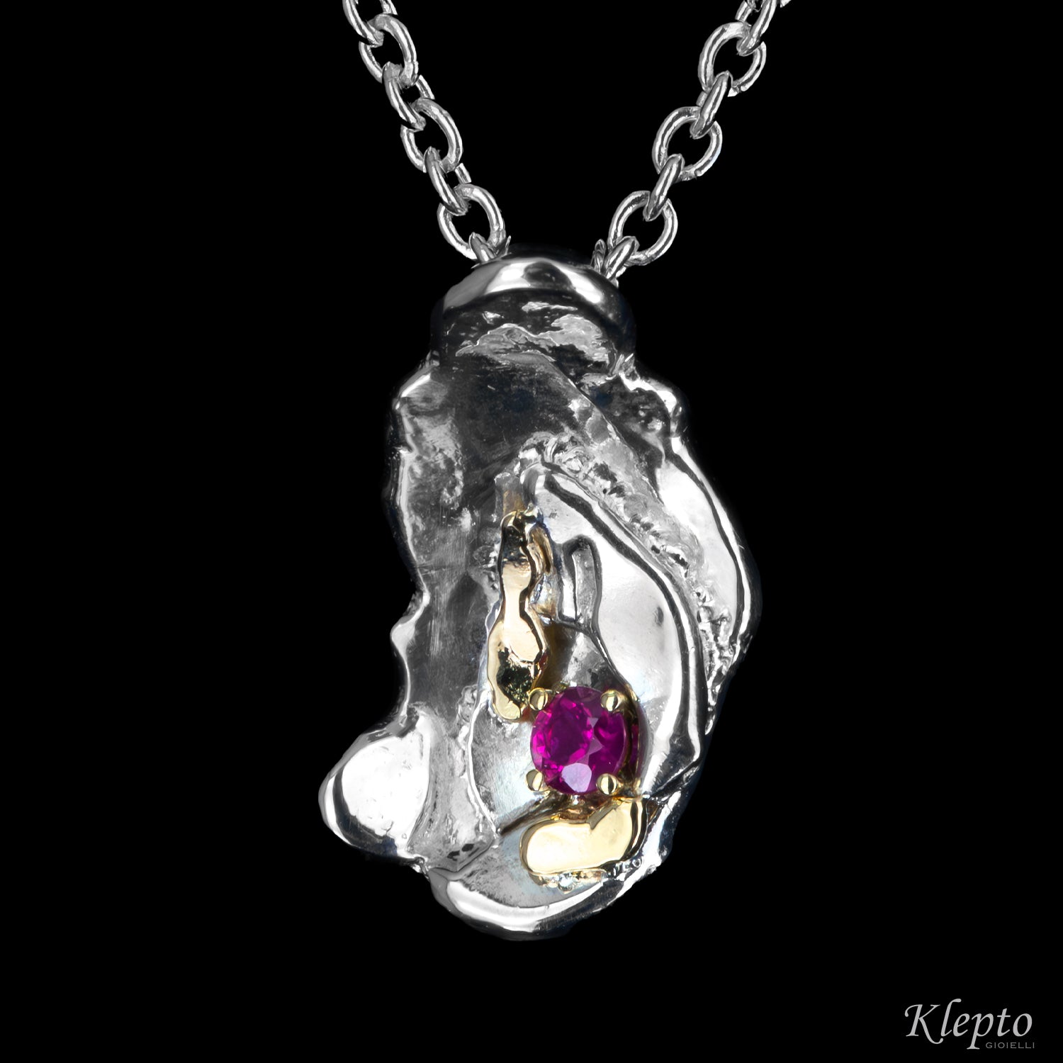 Pendente in Argento Silnova® con Rubino e dettagli in oro giallo
