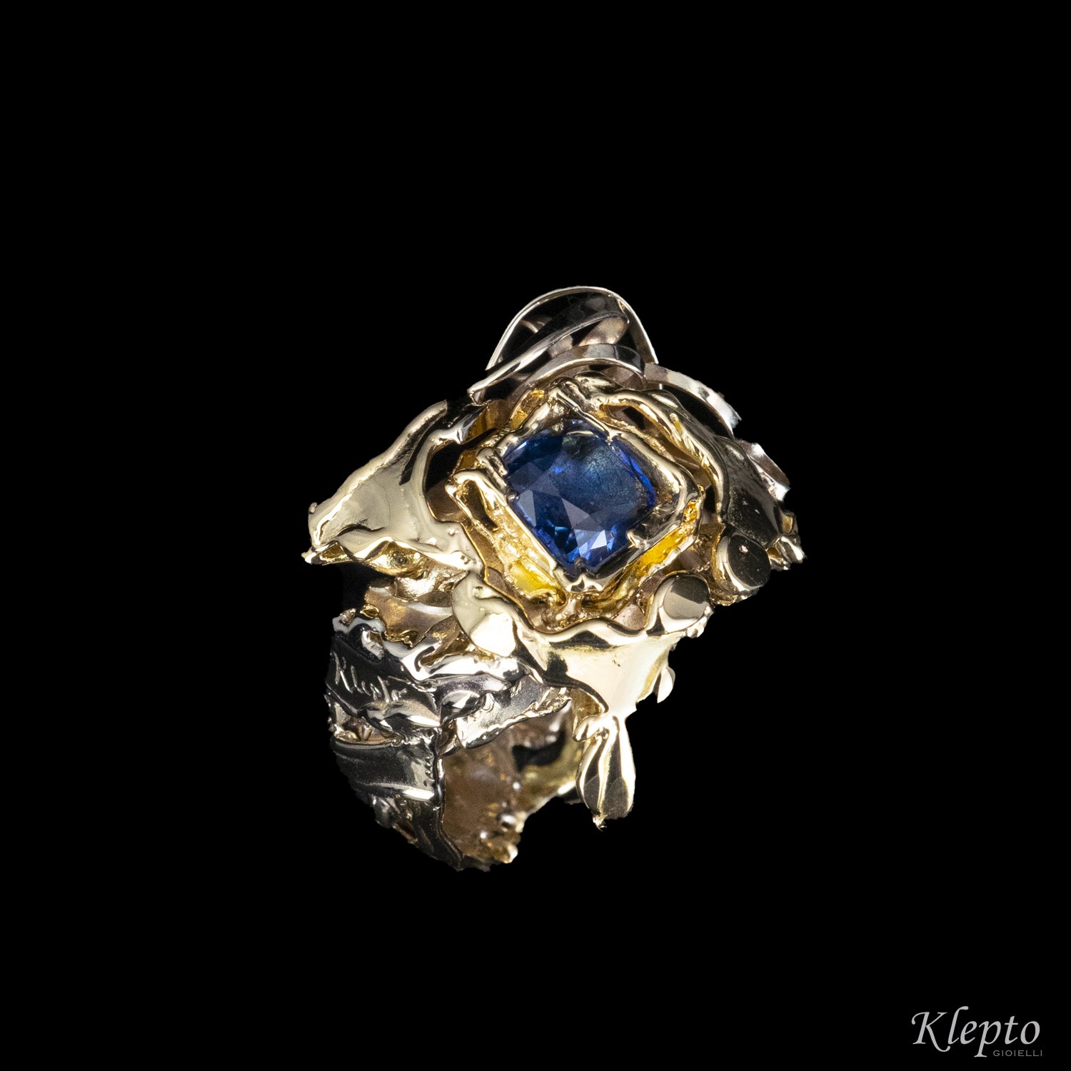 Anello in oro bianco naturale, oro giallo e Zaffiro blu